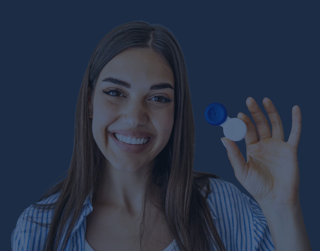 Smiling woman holding a contact lens case